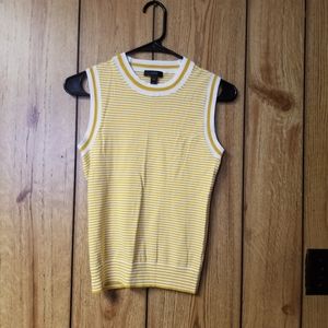 Yellow and gold sweater.